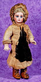 PETITE SIZE 1 FRENCH-TYPE BISQUE DOLL IN ORIGINAL COSTUME. (1 of 2)