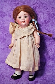 GERMAN ALL-BISQUE CHARACTER WITH SWIVEL NECK.