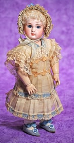 PETITE FRENCH BISQUE FIGURE A BEBE BY JULES STEINER.