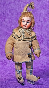 GERMAN BISQUE DOLL IN ORIGINAL COSTUME.