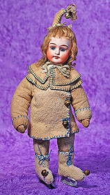 GERMAN BISQUE DOLL IN ORIGINAL COSTUME.: GERMAN BISQUE DOLL IN ORIGINAL COSTUME. 12β. Marks: Alma. Bisque shoulderhead, stationary blue glass eyes, painted lashes, tapered brows, open mouth, accented lips, upper teeth, original blonde