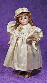 SONNEBERG BISQUE BELTON-TYPE DOLL.: SONNEBERG BISQUE BELTON-TYPE DOLL. 12β. Marks: 4. Bisque solid-dome socket head with two stringing holes, large blue stationary glass eyes, painted lashes, eyeliner, feathered brows, closed mout
