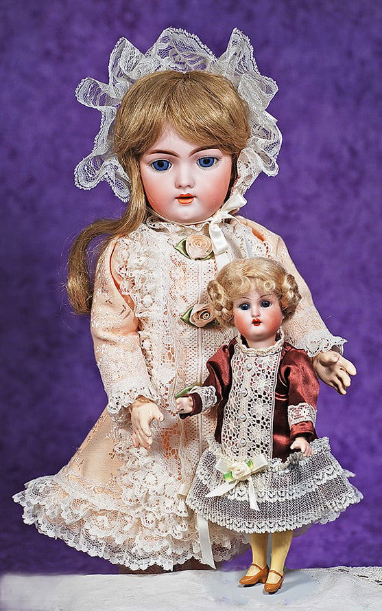 TINY GERMAN BISQUE FLAPPER DOLL BY KAMMER AND REINHARDT.: TINY GERMAN BISQUE FLAPPER DOLL BY KAMMER AND REINHARDT. 8”. Marks: Halbig, K * R. Bisque socket head, blue sleep eyes, painted lower lashes, applied upper lashes, tapered brows, open mouth, acc