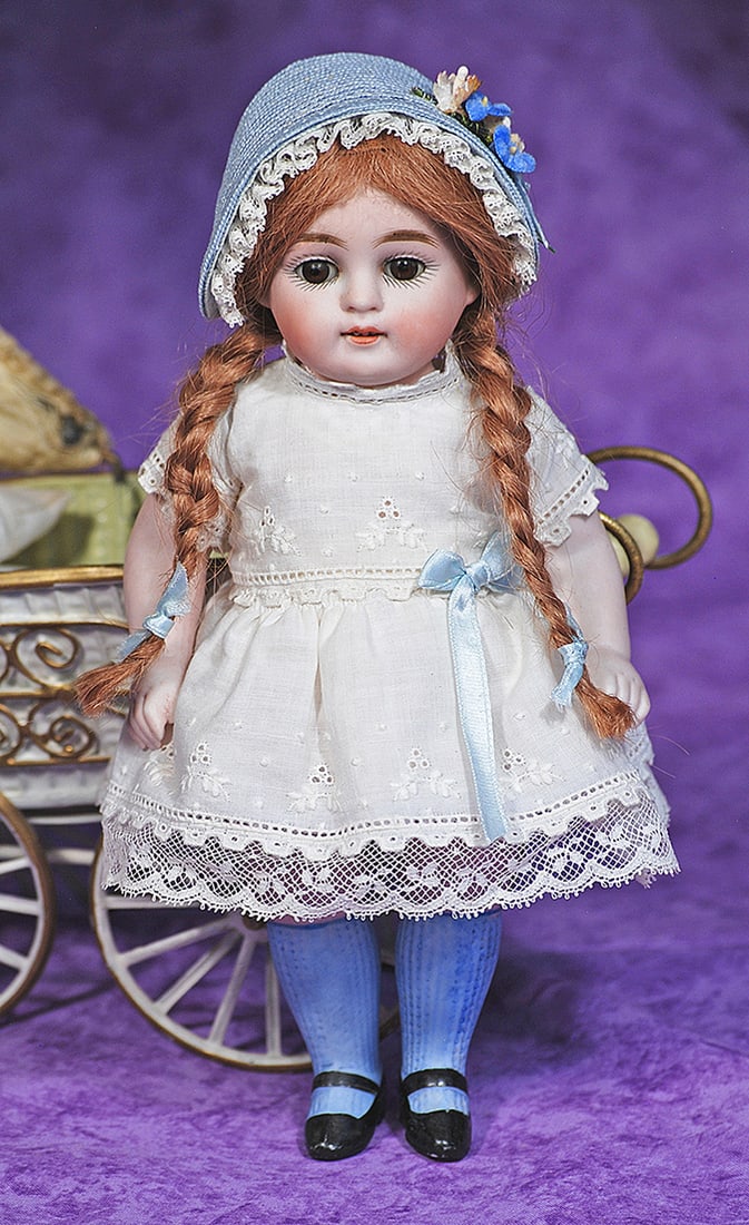 GERMAN ALL-BISQUE DOLL BY KESTNER.: GERMAN ALL-BISQUE DOLL BY KESTNER. 9”. Marks: 180 - 4. All-bisque, jointed at shoulders and hips, painted blue knee stockings and black one-strap heeled shoes. brown sleep eyes, painted lashes,