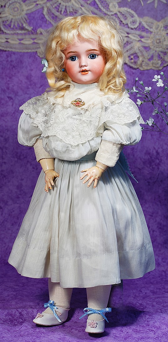 GERMAN BISQUE CHILD, 1249, BY SIMON AND HALBIG.: GERMAN BISQUE CHILD, 1249, BY SIMON AND HALBIG. 23”. Marks: Simon & Halbig 1249, Dep Germany 10. Bisque socket head, blue sleep eyes, painted lashes, eyeliner, molded and feathered brows, pierce
