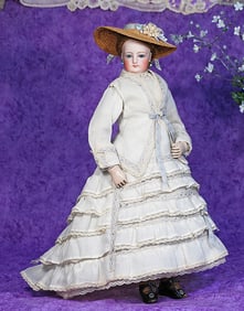 FRENCH BISQUE POUPEE WITH ALL-WOODEN BODY AND DEHORS ARTICULATION BY GAULTHIER.