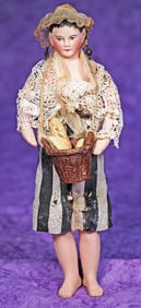 PETITE FRENCH BISQUE DOLL AS PEDDLER BY GAULTHIER.
