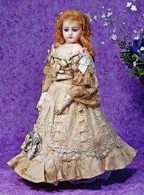 FRENCH BISQUE POUPEE WITH PORTRAIT FACE BY JUMEAU.