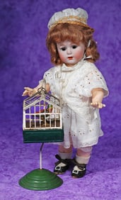 GERMAN TIN WIND-UP BIRD IN CAGE WITH STAND.