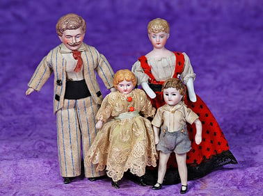 FOUR GERMAN BISQUE DOLLHOUSE DOLLS.
