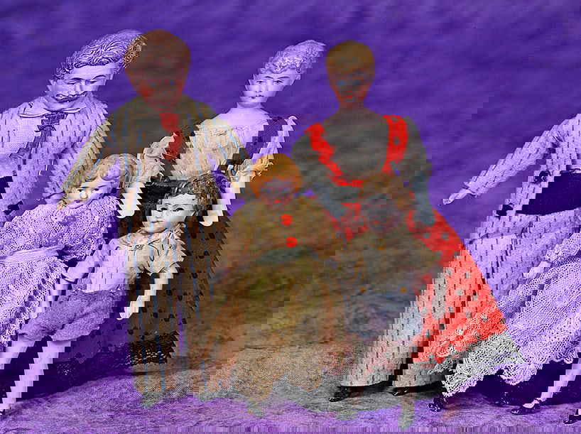 FOUR GERMAN BISQUE DOLLHOUSE DOLLS.: FOUR GERMAN BISQUE DOLLHOUSE DOLLS. 3 ½” to 5 ½”. Three are bisque shoulderhead dolls with sculpted hair, painted features, muslin body with bisque lower limbs, gentleman with mu