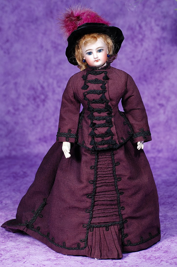 FRENCH BISQUE POUPEE BY GAULTHIER.: FRENCH BISQUE POUPEE BY GAULTHIER. 14”. Marks: 1 on head, F.G. on shoulderplate. Bisque swivel head, blue almond-shaped paperweight eyes, painted lashes, dark eyeliner, feathered brows, pierced