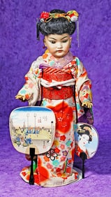 GERMAN BISQUE ASIAN PORTRAIT DOLL, 1199, BY SIMON AND HALBIG. 15”. Marks: