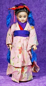 GERMAN BISQUE ASIAN PORTRAIT DOLL, 1199, BY SIMON AND HALBIG.