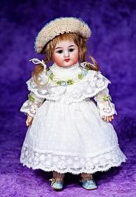 PETITE GERMAN BISQUE DOLL BY SIMON AND HALBIG.
