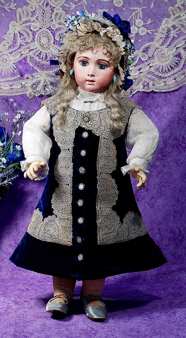 EXCEPTIONALLY BEAUTIFUL TRISTE JUMEAU BEBE SIZE 13.: EXCEPTIONALLY BEAUTIFUL TRISTE JUMEAU BEBE SIZE 13. Marks: 13. 30”. Bisque socket head with long-face modeling and pensive expression, blue paperweight eyes encircled by dark eyeliner, painted l