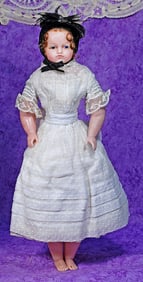 EARLY ENGLISH POURED WAX DOLL.