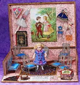 CHARMING PRESENTATION BOX WITH ALL-BISQUE DOLL AND ACCESSORIES.