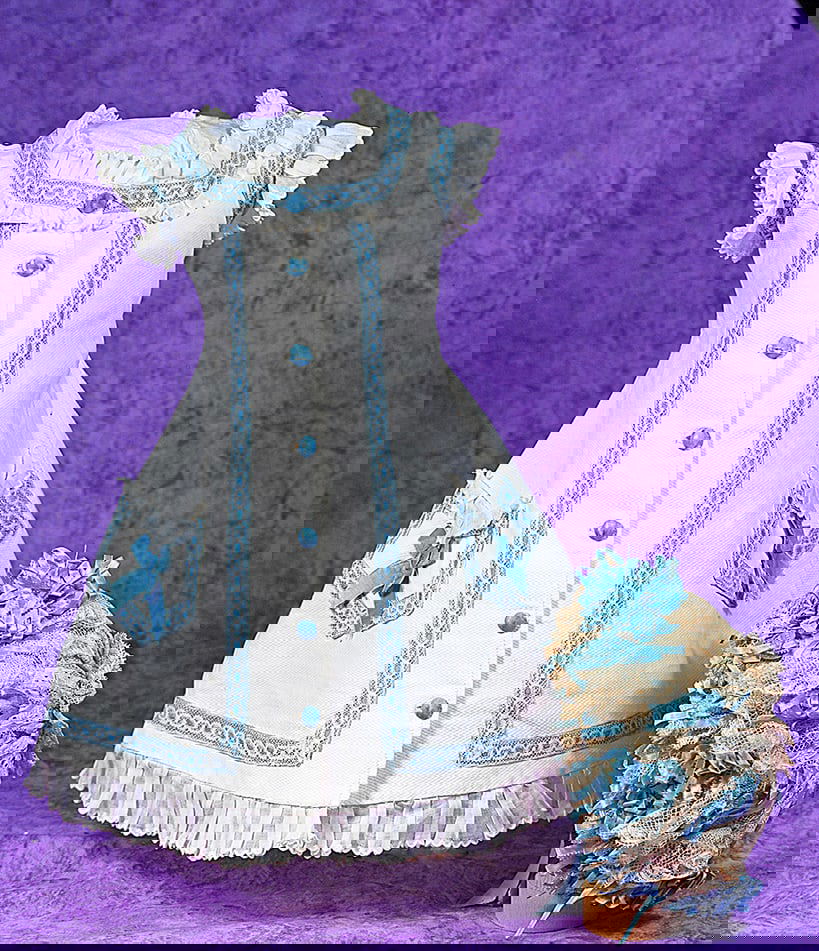 FINE ANTIQUE COTTON PIQUE DOLL GOWN AND LACE BONNET. (1 of 2)