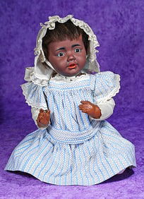 RARE GERMAN BISQUE BABY HILDA BY KESTNER WITH RICH BROWN COMPLEXION.