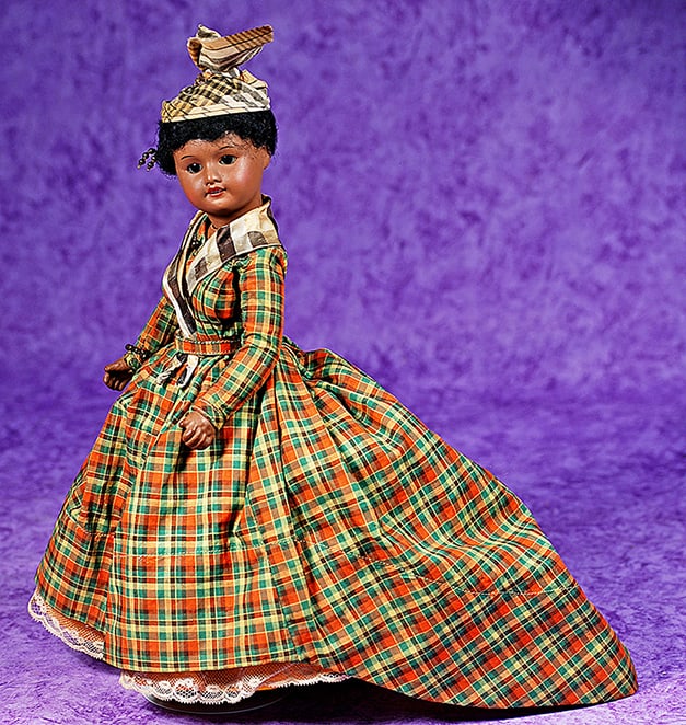 ALL-ORIGINAL FRENCH BROWN-COMPLEXIONED BISQUE DOLL BY UNIS.: ALL-ORIGINAL FRENCH BROWN-COMPLEXIONED BISQUE DOLL BY UNIS. 12”. Marks: Unis France 60. Brown bisque socket head, stationary brown glass eyes, painted lashes, tapered brows, open mouth, upper te