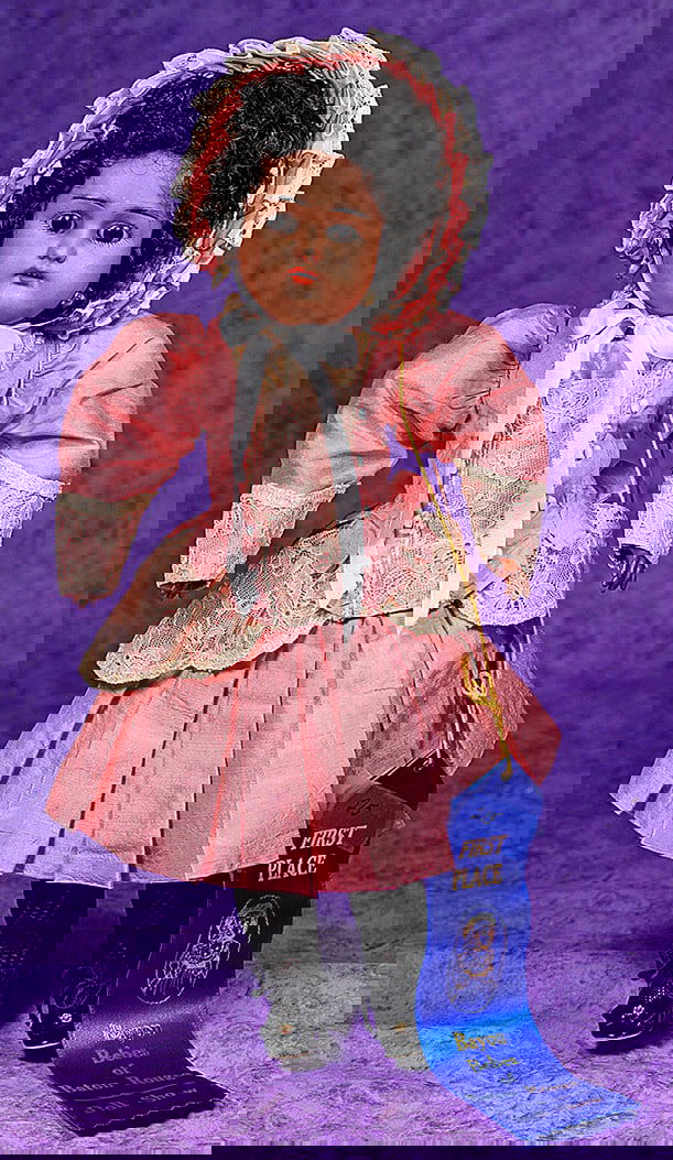 BROWN GERMAN BISQUE CHILD DOLL BY FRANZ SCHMIDT.: BROWN GERMAN BISQUE CHILD DOLL BY FRANZ SCHMIDT. 14 ½”. Marks: S & C, Simon & Halbig. Brown bisque socket head, brown sleep eyes, painted lashes, eyeliner, feathered black brows, pierced ea