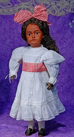 GERMAN BISQUE BROWN-COMPLEXIONED DOLL BY C. M. BERGMANN.