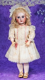 FRENCH BISQUE BEBE BY S.F.B.J. WITH RED X MARKING.