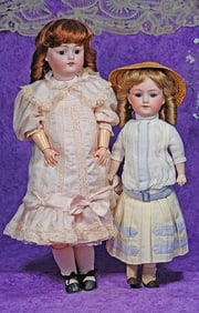 TWO GERMAN BISQUE DOLLS.