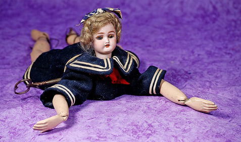 BISQUE MECHANICAL SWIMMING DOLL MISS ONDINE.