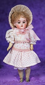 PETITE GERMAN BISQUE DOLL BY ERNST HEUBACH.