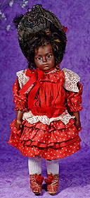 ARTIST FRENCH BISQUE BROWN-COMPLEXIONED BRU JNE BEBE.: ARTIST FRENCH BISQUE BROWN-COMPLEXIONED BRU JNE BEBE. 14β . Marks: Bru Jne 5. Brown bisque swivel head on brown bisque shoulderplate, inset brown glass eyes, painted lashes, tapered black brows,