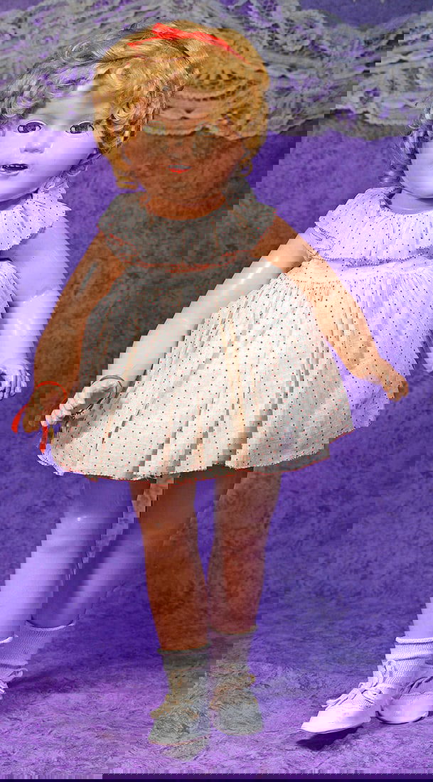 COMPOSITION SHIRLEY TEMPLE BY IDEAL.: COMPOSITION SHIRLEY TEMPLE BY IDEAL. 24”. Marks: Shirley Temple, Ideal . Composition socket head on five-piece jointed composition body, sleep eyes, painted lower lashes, applied upper lashes, f