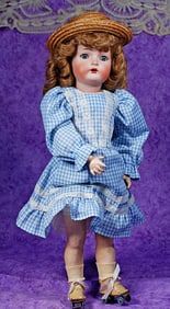 GERMAN BISQUE CHILD DOLL BY KAMMER AND REINHARDT. WITH WALKER BODY. 21”.