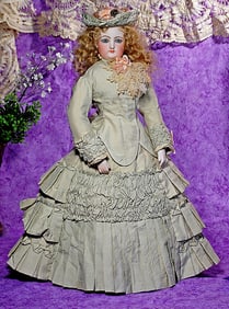 FRENCH BISQUE POUPEE BY GAULTHIER WITH GESLAND BODY.