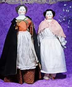TWO GERMAN CHINA LADY DOLLS. 21” and 19”.