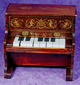 TOY WOODEN PIANO BY SCHOENHUT. 10”.