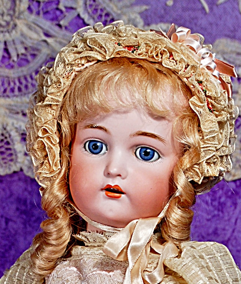 PRETTY GERMAN BISQUE CHILD BY KESTNER.: 2. PRETTY GERMAN BISQUE CHILD BY KESTNER. 25”. Marks: L. S & H, K * R 62. Bisque socket head, blue sleep eyes, painted lashes, eyeliner, feathered brows, pierced ears, open mouth, accented lips,