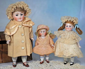THREE GERMAN ALL-BISQUE DOLLS