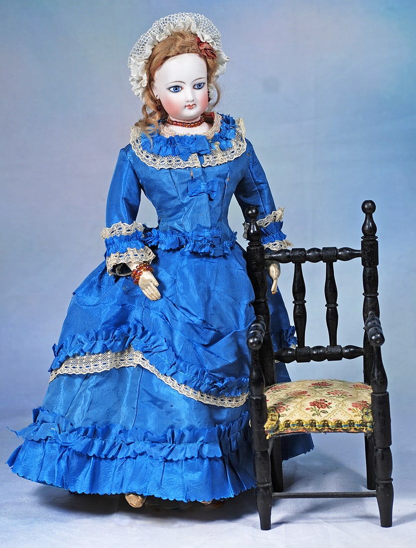 DOLL CHAIR WITH UPHOLSTERED SEAT: 10”. Spindle back arm chair with ebony finish, tapestry upholstered seat