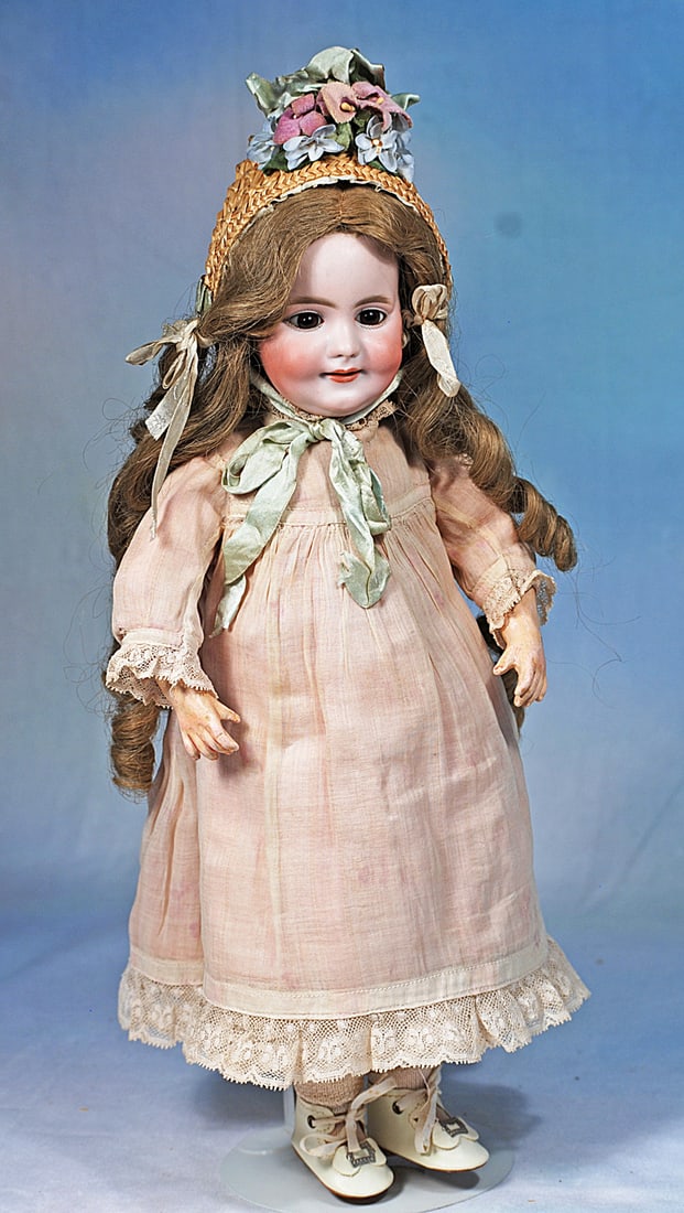 RARE SIMON AND HALBIG, 969. SMILING CHARACTER CHILD: 14 ½”. Marks: 969 S & H Halbig Dep. Bisque socket head smiling child with highly characterized features, stationary brown glass eyes, painted lashes, eyeliner, feathered brows,