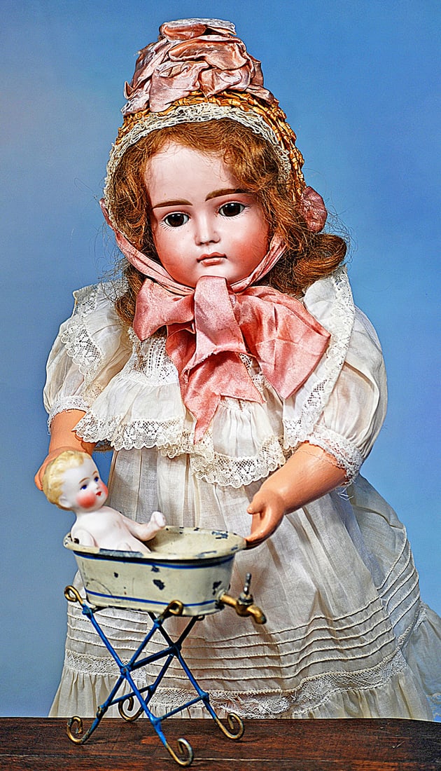 EARLY GERMAN BISQUE, MODEL XI DOLL BY KESTNER: 16”. Marks: XI. Bisque socket head, brown sleep eyes, painted lashes, eyeliner, feathered brows, plump cheeks, closed mouth, center accent line between lips, brown human hair wig,