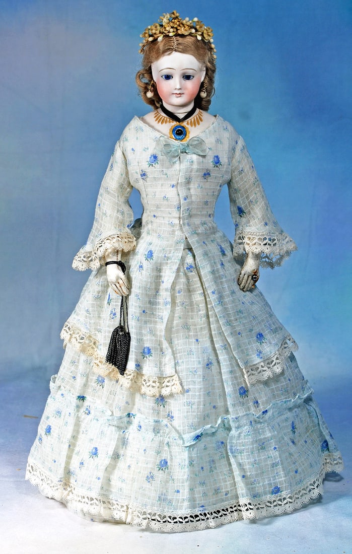 VERY RARE FRENCH BISQUE POUPEE BY EDMOND ROCHARD WITH STANHOPE-JEWELED THROAT: 16”. Bisque swivel head with flat-cut neck on bisque shoulderplate, inset cobalt blue glass eyes, painted lashes, eyeliner, feathered brows, closed mouth with outlined lips, pierced ears,