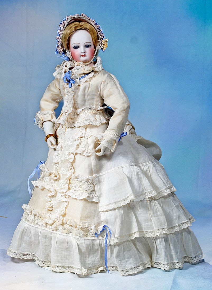 FRENCH BISQUE POUPEE WITH KID-OVER-WOODEN BODY AND BISQUE ARMS (1 of 2)