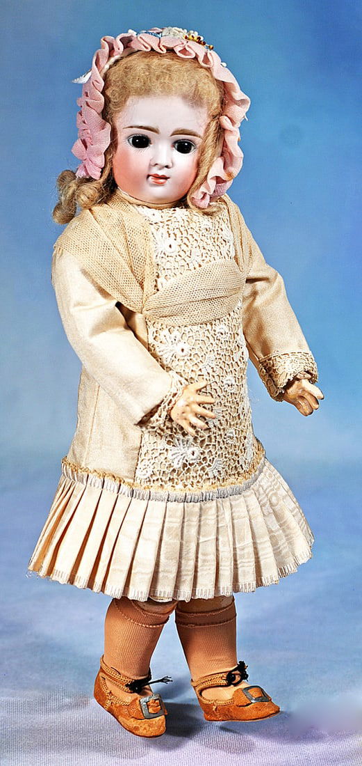 GERMAN BISQUE CLOSED MOUTH DOLL BY KESTNER: 14”. Marks: 6. Bisque socket head, stationary brown glass eyes, painted lashes, feathered brows, un-pierced ears, closed mouth, accented lips, blonde mohair wig, composition and wood