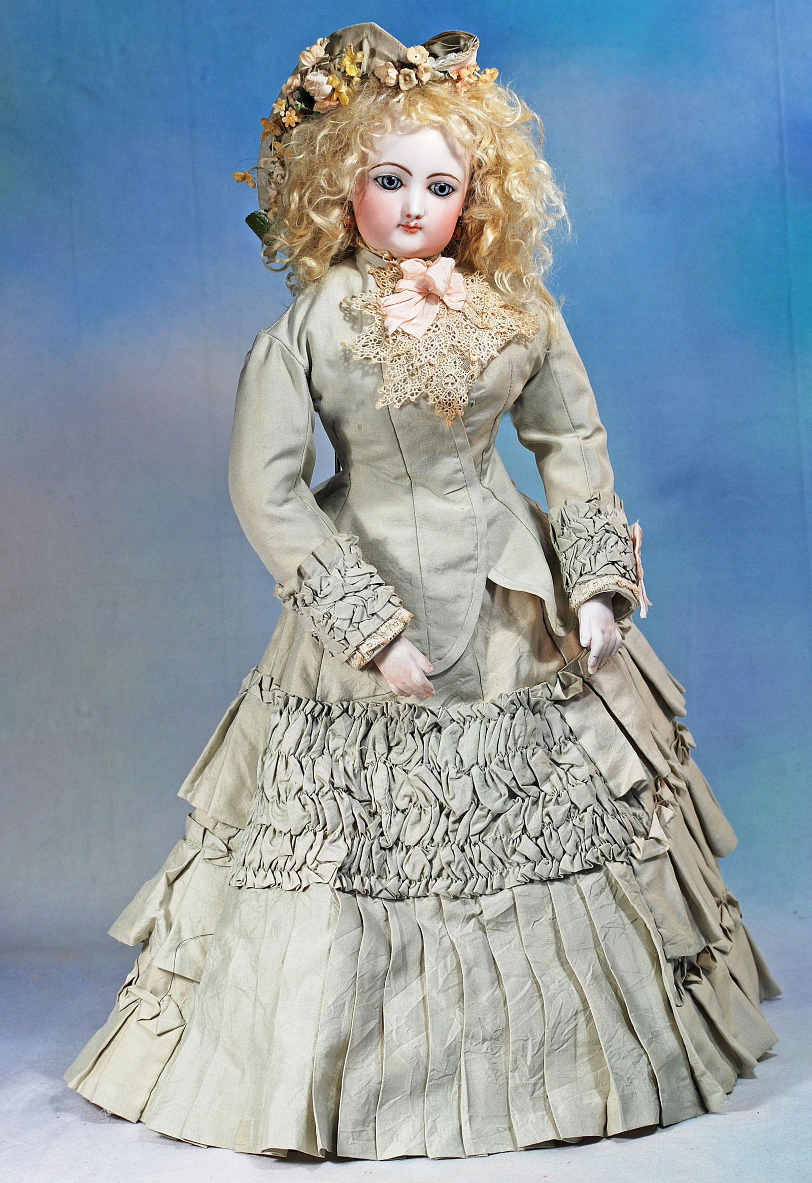 FRENCH BISQUE POUPEE BY GAULTHIER WITH GESLAND BODY AND BISQUE HANDS. (1 of 2)