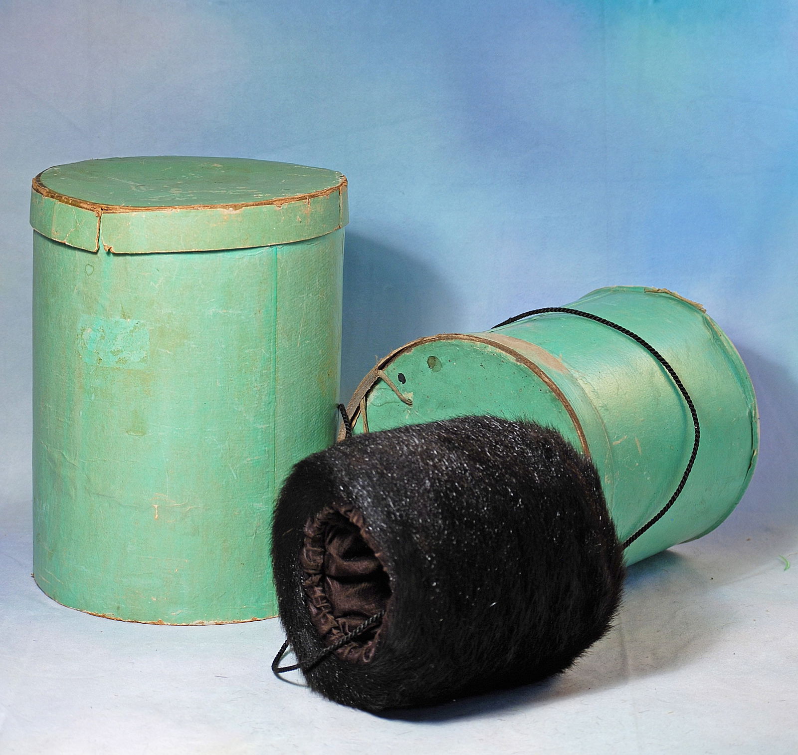 ANTIQUE BLACK FUR MUFF AND TWO FRENCH HAT BOXES. (1 of 1)