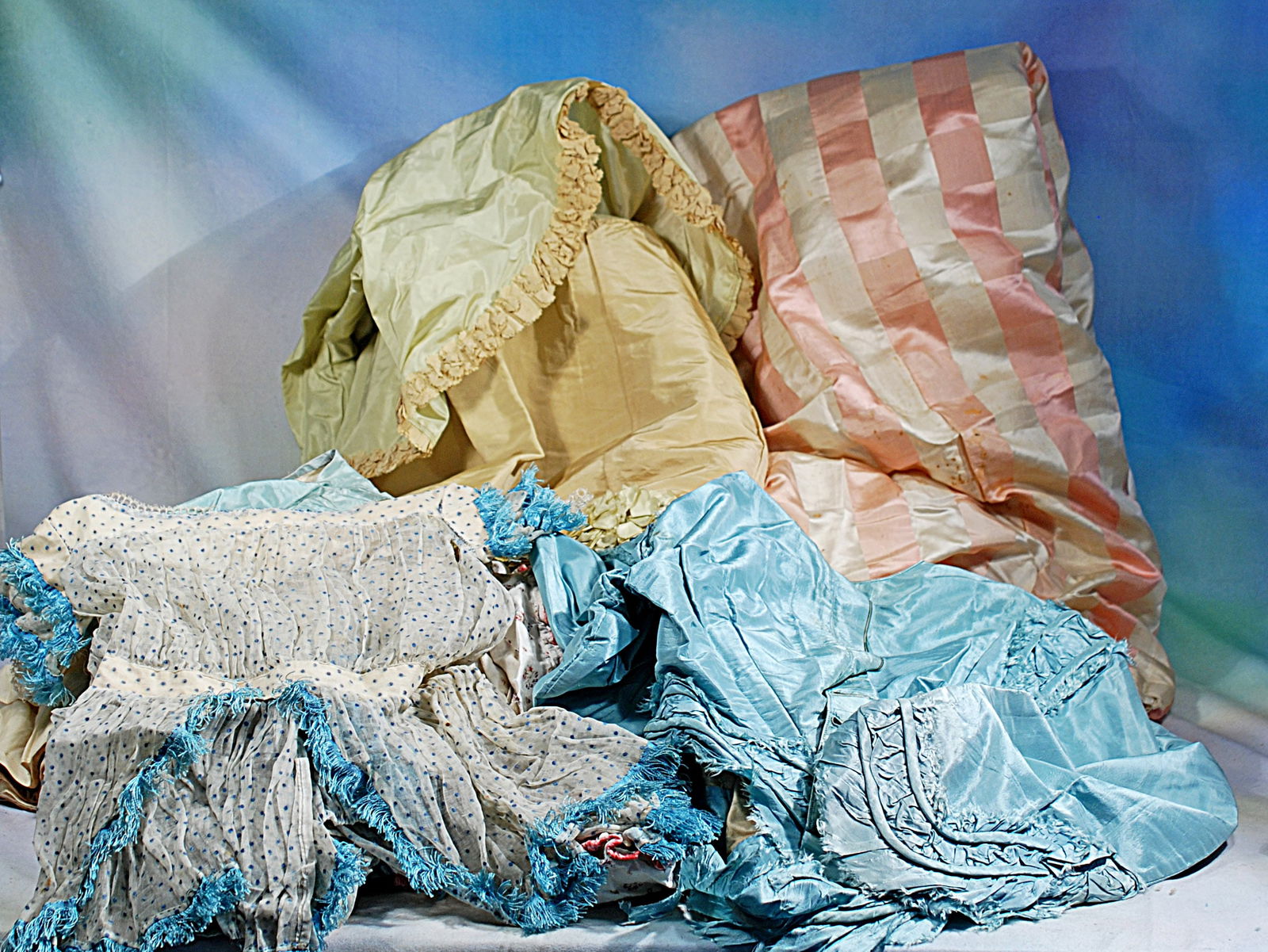 ASSORTMENT OF VICTORIAN-ERA FABRICS AND CLOTHING: Mostly silk and cotton in various colors and conditions, suitable for doll cosotuming.