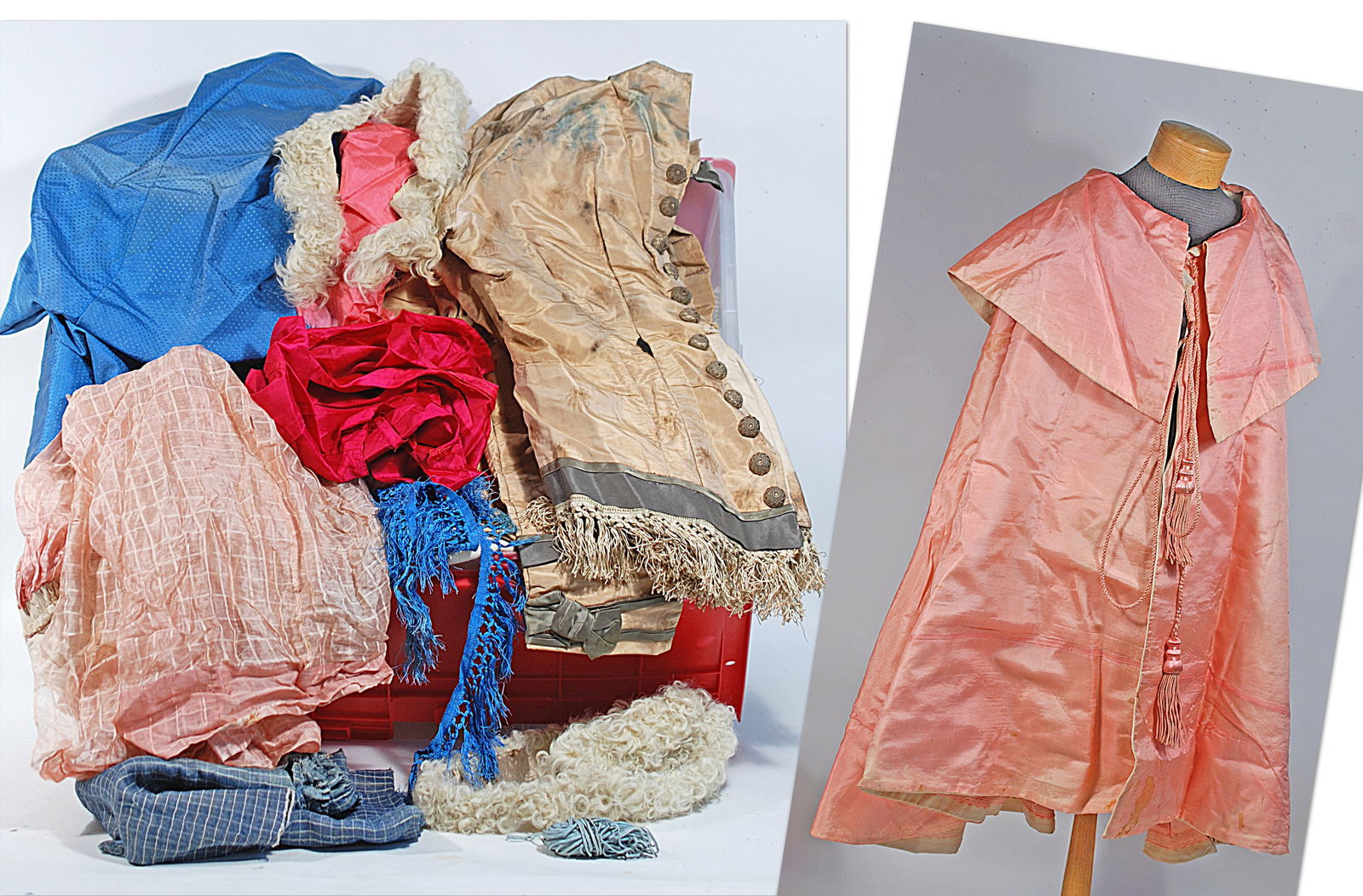 ANTIQUE PINK SILK LADIES CLOAK AND LARGE CONTAIER OF VICTORIAN-ERA FABRICS AND GARMENTS: ANTIQUE PINK SILK LADIES CLOAK AND LARGE CONTAIER OF VICTORIAN-ERA FABRICS AND GARMENTS. Pink silk ladies evening cloark with cord ties and tassels, plus a 23' 16" x 12" container filled with numberou