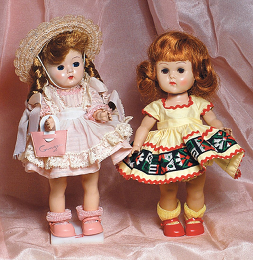 AMERICAN HARD PLASTIC DOLLS “GINGER” & “GINNY”. Each: AMERICAN HARD PLASTIC DOLLS “GINGER” & “GINNY”. Each is 8” hard plastic, molded-lash walker; Ginger in tagged pink and white party dress and pinafore, straw hat, pink vinyl shoes and Ginger